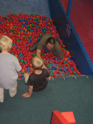 Ben in the ball pit, Cole and Tim watching (07-11-2009 11:08)