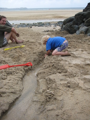 Cole digging a canal while Ben watches (07-13-2009 15:52)