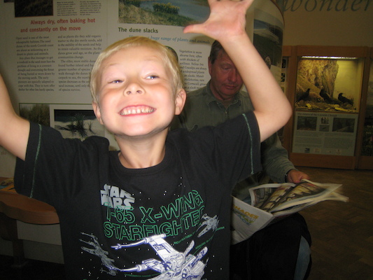 Tim making faces at the Truro museum with Granddad (07-14-2009 10:32)