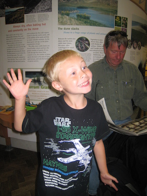 Tim making faces at the Truro museum with Granddad (07-14-2009 10:32)