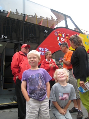 Tim and Cole by a double decker bus (07-20-2009 10:17)