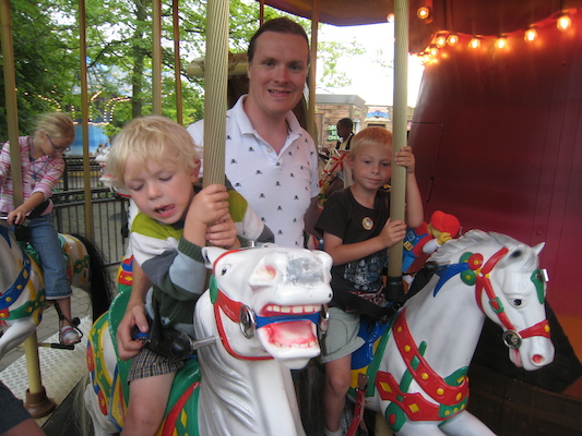 Cole, Ben and Tim on a merry-go-round (07-22-2009 16:34)