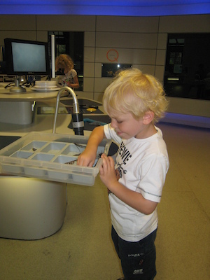 Cole investigating at the natural history museum (07-24-2009 11:02)