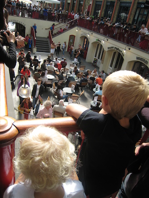 Cole and Tim watching the musicians at Covent Garden (07-24-2009 15:25)