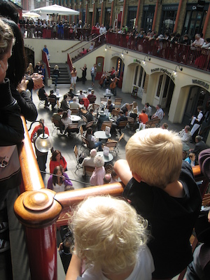 Cole and Tim watching the musicians at Covent Garden (07-24-2009 15:26)