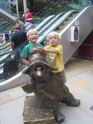 Tim and Cole with the Paddington statue (07-25-2009 08:48)