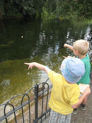 Cole and Tim watching the fish at the park (07-25-2009 12:42)