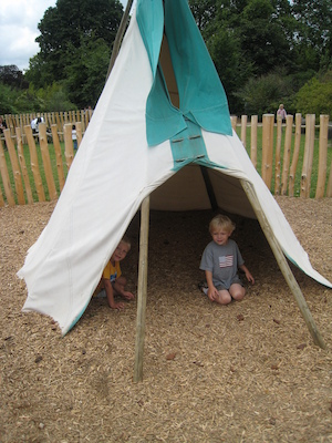 Tim and Cole in a wigwam at the Princess Diana playground (07-26-2009 14:45)