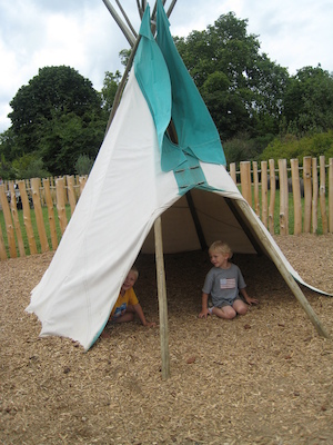 Tim and Cole in a wigwam at the Princess Diana playground (07-26-2009 14:46)
