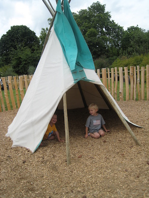 Tim and Cole in a wigwam at the Princess Diana playground (07-26-2009 14:46)