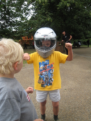 Cole and Tim with a motorcycle helmet on (07-26-2009 15:18)