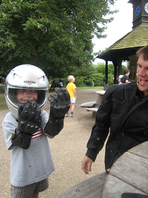Cole with a motorcycle helmet on with Johnny and Tim (07-26-2009 15:19)