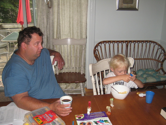 Matt and Cole at breakfast (08-15-2009 06:06)
