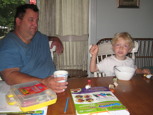 Matt and Cole at breakfast (08-15-2009 06:06)