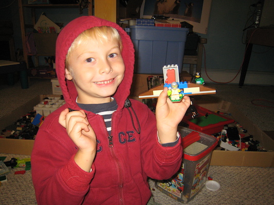 Tim with Lego spaceship (10-15-2009 16:12)