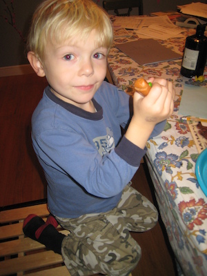 Cole and hot dog snake (11-16-2009 17:04)