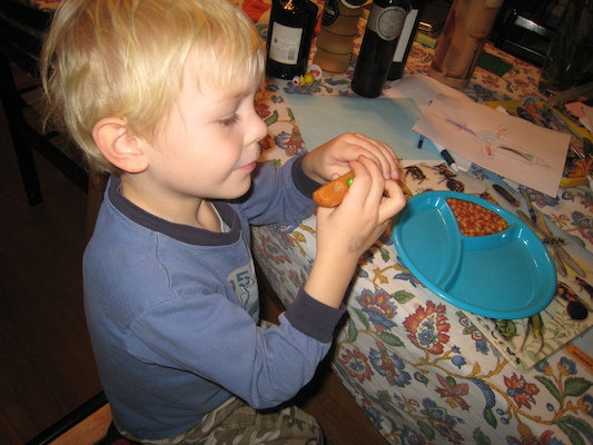 Cole and hot dog snake (11-16-2009 17:04)