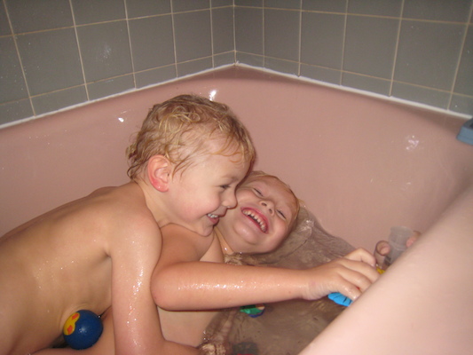Tim and Cole in the tub (11-24-2009 18:54)