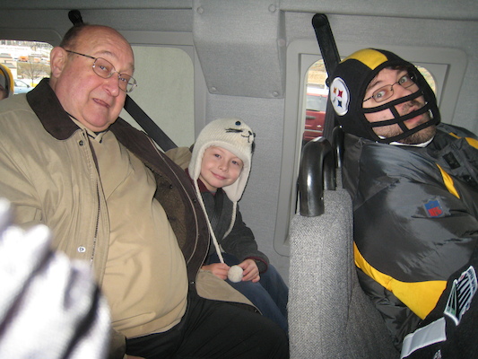 Poppy, Tim and Juj on the way to the game (12-27-2009 11:01)