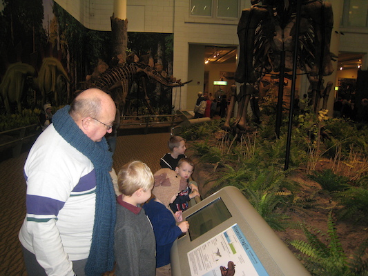 Poppy, Tim and Cole with the dinosaurs (12-30-2009 11:25)