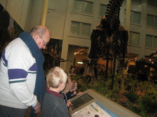 Poppy, Tim and Cole with the dinosaurs (12-30-2009 11:25)