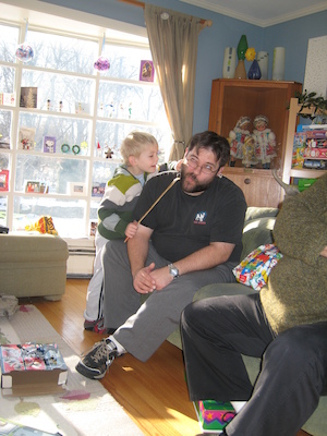 Cole using the back-scratcher on Juj (01-16-2010 11:43)