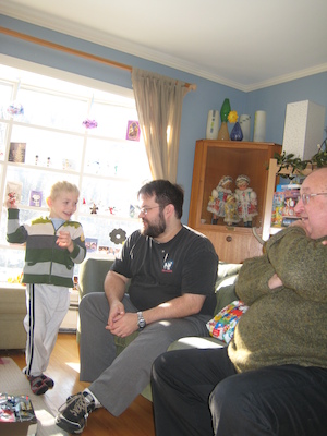 Cole using the back-scratcher on Juj (01-16-2010 11:43)