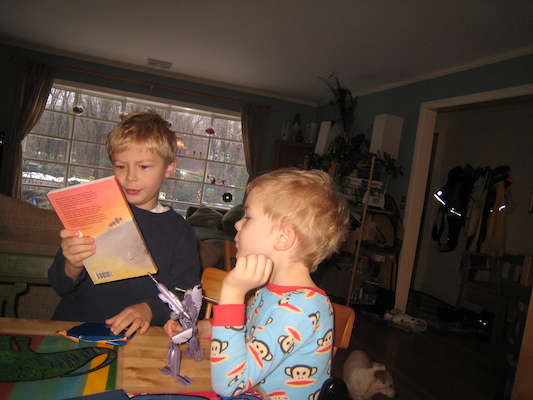 Tim opening presents with Cole (03-01-2010 07:03)