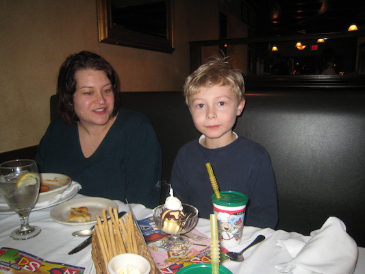 Tim blowing out his candle with Xine (03-01-2010 17:56)