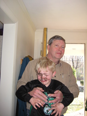 Granddad and Cole after a mud fight (03-18-2010 21:20)