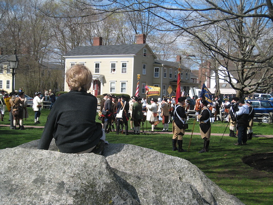 Tim on a rock with revolutionaries (04-10-2010 09:22)