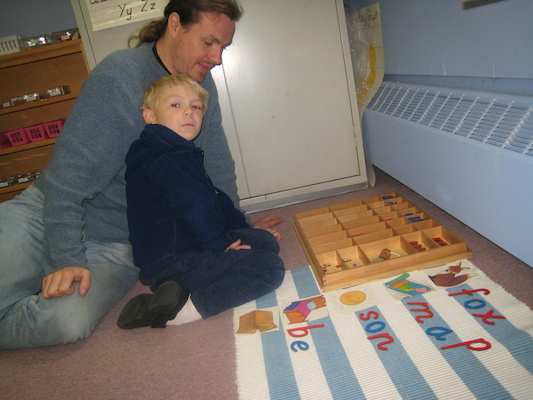 Cole doing the moveable alphabet with Ben (04-28-2010 09:17)