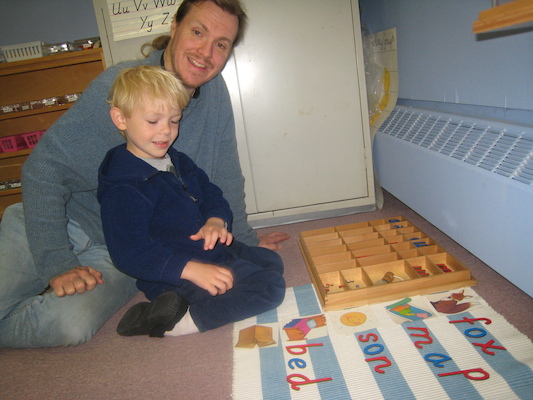 Cole doing the moveable alphabet with Ben (04-28-2010 09:17)