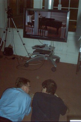 Rev. John and David watch the sermon (05-30-2010 14:46)