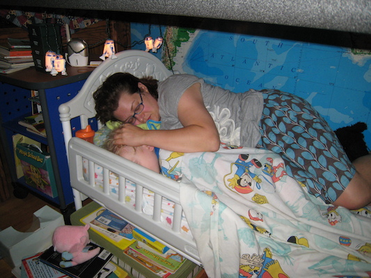 Cole sleeping and Xine cuddling (06-16-2010 20:34)