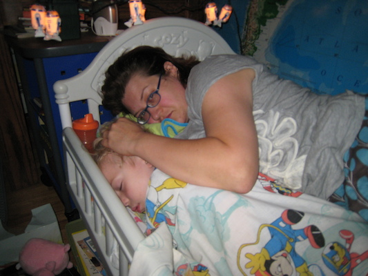 Cole sleeping and Xine cuddling (06-16-2010 20:34)