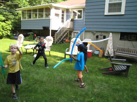 Lightsaber fighting at Cole's Birthday party (06-20-2010 15:36)