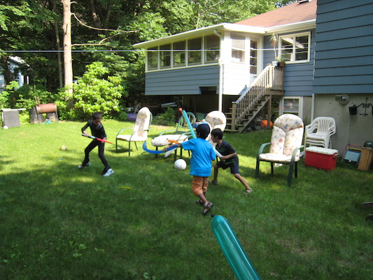 Lightsaber fighting at Cole's Birthday party (06-20-2010 15:36)