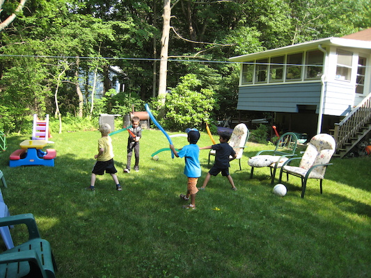 Lightsaber fighting at Cole's Birthday party (06-20-2010 15:36)