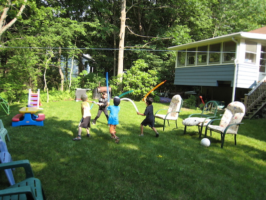 Lightsaber fighting at Cole's Birthday party (06-20-2010 15:37)