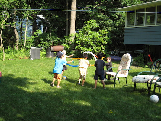 Lightsaber fighting at Cole's Birthday party (06-20-2010 15:37)