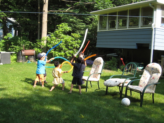 Lightsaber fighting at Cole's Birthday party (06-20-2010 15:37)