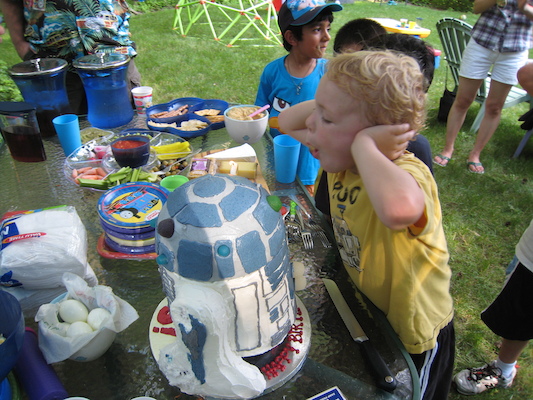 Cole blowing out the candle (06-20-2010 16:39)
