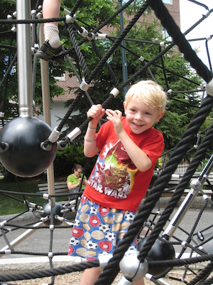 Cole climbing near the Galleria (06-22-2010 12:21)