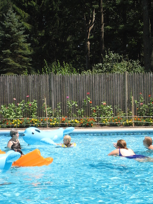 Tim swimming at the Cordes' pool party (07-17-2010 13:04)