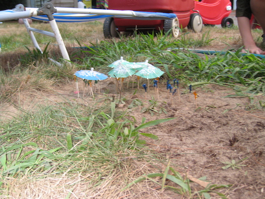 Cole and Tim building a beach at the Tatroe's party (07-17-2010 18:43)