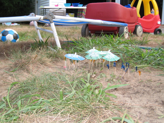 Cole and Tim building a beach at the Tatroe's party (07-17-2010 18:43)