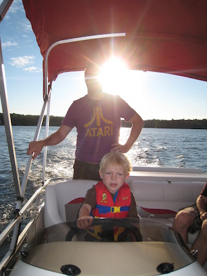 Cole piloting the boat (07-18-2010 18:01)