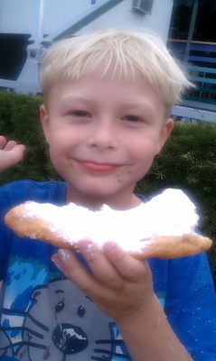 Tim eating fried dough (08-15-2010 18:26)