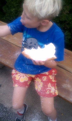 Tim eating fried dough (08-15-2010 18:26)